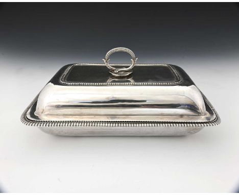 Paul Storr, a George III Regency silver entree dish and cover, of rectangular form, with gadroon edge border, ensuite with a 