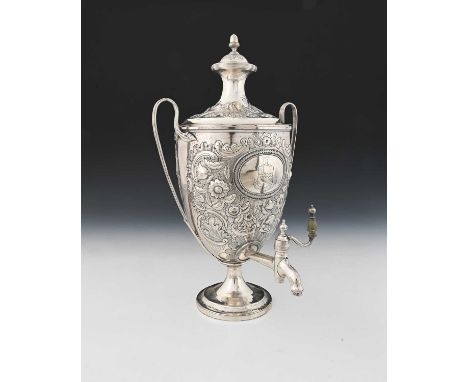 Paul Storr, a George III silver tea urn, of Neoclassical form, with reeded loop handles, the detachable cover with acorn fini