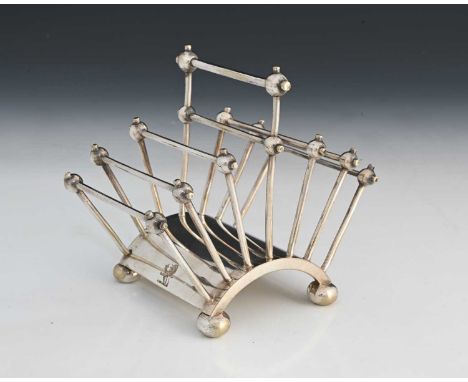 Christopher Dresser for Hukin and Heath, an Aesthetic Movement silver plated six division toast rack, model 2556, circa 1885,