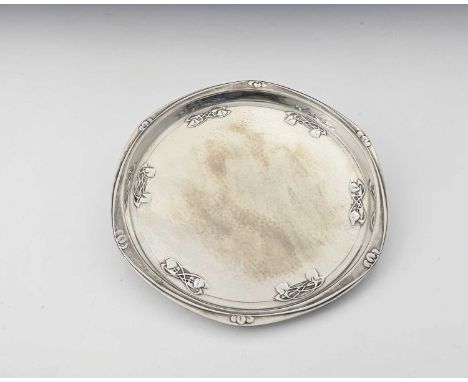 Archibald Knox for Liberty and Co., a Tudric Arts and Crafts pewter tray, model 0716, hexagonal rimmed circular form, planish