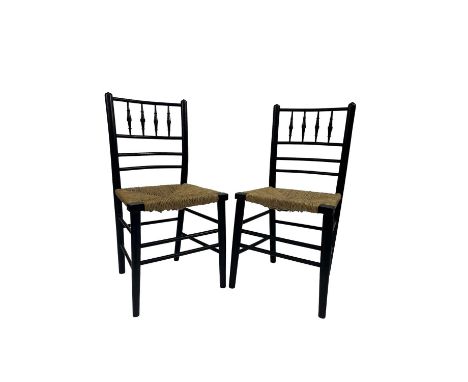 Attributed to Phillip Webb (British, 1831-1915), for Morris and Co, a set of four ebonised 'Sussex' side chairs, ring turned 