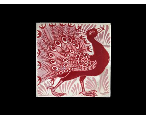 William De Morgan, an Arts and Crafts ruby lustre Peacock tile, Chelsea, circa 1880, painted with a bird facing right, on a f