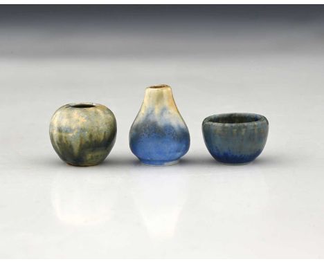 Ruskin Pottery, three miniature Crystalline glazed vases, circa 1930, green and blue banded, impressed marks and paper label,