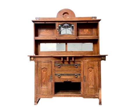 Attributed to Shapland and Petter, an Arts &amp; Crafts oak dresser, base with two central drawers over a shelf and two flank