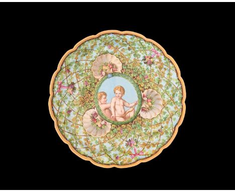 Thomas Kirkby (attributed) for Minton, an Urbino Majolica style faience painted comport, circa 1864, footed and scalloped, th