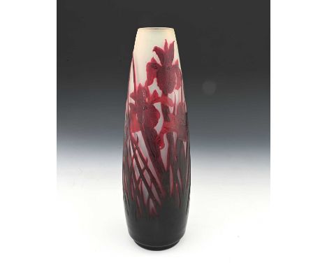 Emile Galle, a ruby cased Iris glass cameo vase, circa 1890, conical barrel form, incuse marks Galle, 37cm high