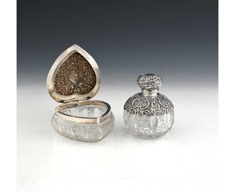 A Victorian silver-mounted cut glass scent bottle, of grenade form, the silver decorated with diaper work, and rococo scrolls