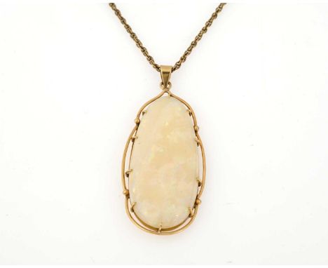 An 18ct gold opal cabochon single-stone pendant, with wirework surround, suspended from a yellow metal fancy-link chain, opal