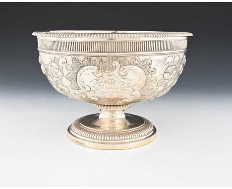 Paul Storr, a George III silver punch bowl, the body with dentil border, and gadroon edge rim, atop a spreading, stepped circ