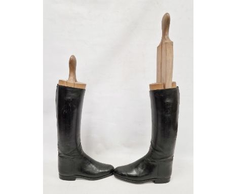 Pair of black leather riding boots with wooden trees, stamped 8 1/2 D / 3532 7, the trees incised L and R Condition ReportBoo