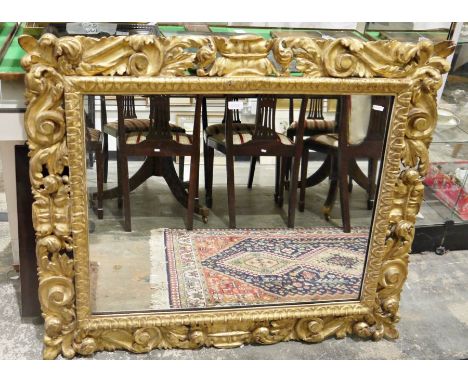 Rectangular gilt-framed wall mirror, scroll and foliate decorated&nbsp;