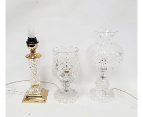 Waterford glass lamp base with thistle-shaped shade on baluster diamond-pattern base together with two further cut glass lamp