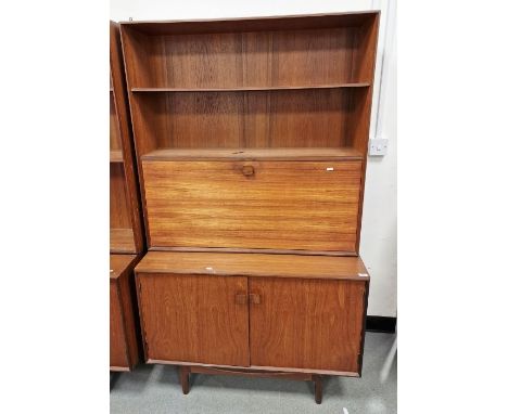 Mid-century teak G-plan display cabinet&nbsp;designed by Kofod Larsen&nbsp;with single shelf above drop down cabinet over a t