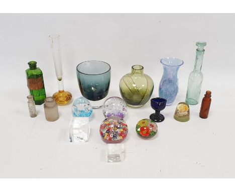 Assorted paperweights and coloured glassware, including blue tinted eye bath, five small medicine bottles, a Caithness moonbe