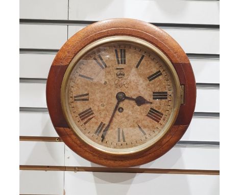 Oak cased circular wall clock, the painted dial with Roman numerals marked 'G VI R' with crown, balance wheel escapement move