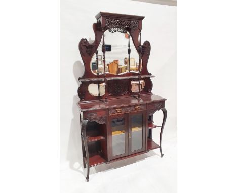 Edwardian mahogany mirror-backed sideboard with scroll shaped shelf flanked by baluster supports and urns above glazed centra