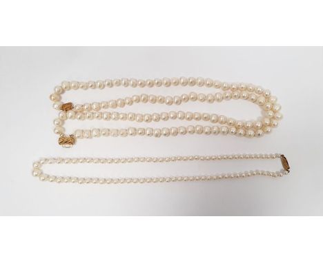 Set of simulated graduating pearls on 9ct gold clasp and a set of two-string pearl necklace on gold-coloured clasp marked '14