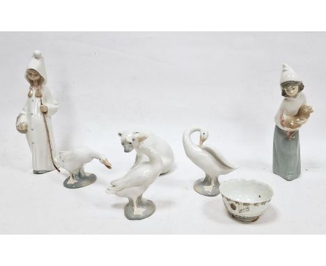 Four Lladro models of animals&nbsp;and two figures of girls, 20th century, printed blue marks comprising a recumbent polar be