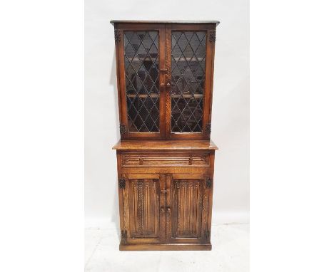 20th century oak glazed kitchen cabinet&nbsp;with leaded glazed double doors enclosing two shelves, above frieze drawer and t