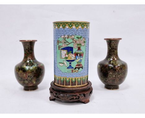 Chinese cloisonne enamel cylindrical vase, 20th century, decorated with a vase of flowers, a tazza of fruit and other items r