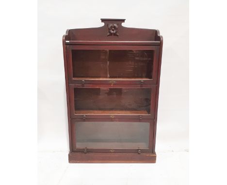 Edwardian dark stained Globe Wernicke-style three-tier bookcase&nbsp;with flowerhead carved roundel to upper shelf, above thr