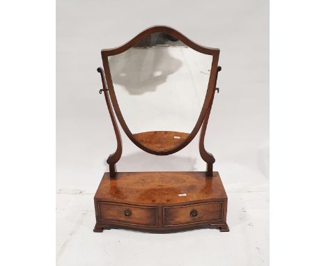 Walnut toilet mirror, the shield-shaped plate on serpentine fronted base with two drawers, pair bracket feet, 43cm wide&nbsp;