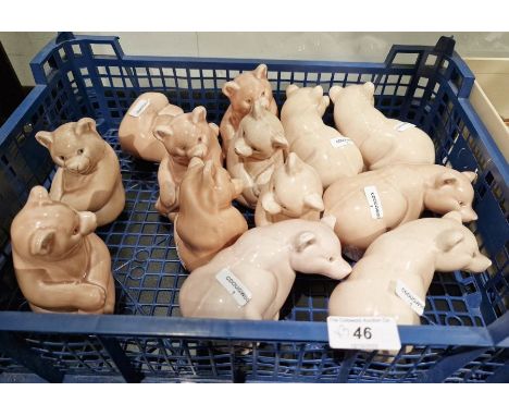 Large collection of Poole pottery animals, 20th century, printed marks, comprising 13 models of bears seated and standing, a 
