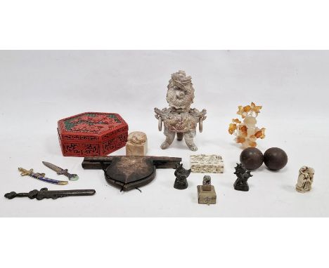 Chinese cinnabar lacquer hexagonal box and cover, a carved agate vase and cover, a dog of Fo soapstone seal, a carved soapsto