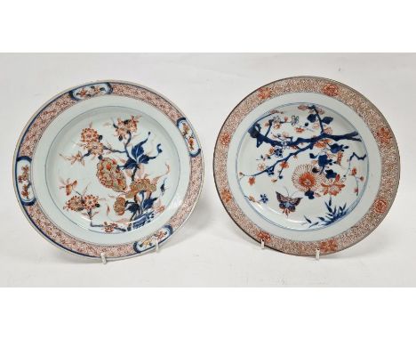 Two Chinese Imari pattern plates, 18th century, each painted in underglaze blue and decorated in iron-red and gilding with fl