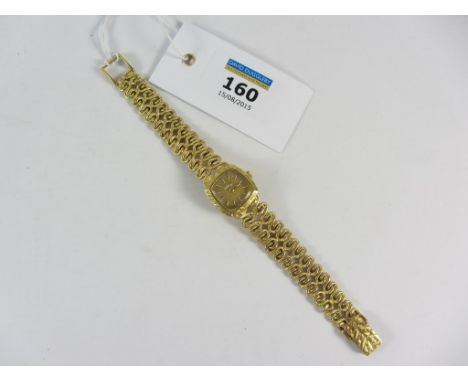 Eterna hallmarked 18ct gold wristwatch with integral bracelet, cushion shaped case, mechanical movement, case no. 6137632 wei