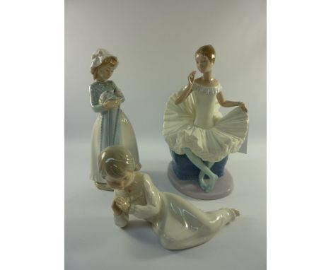Nao figure of a seated ballerina H25cm, Nao figure of a girl holding a puppy and one other Nao figure (3)