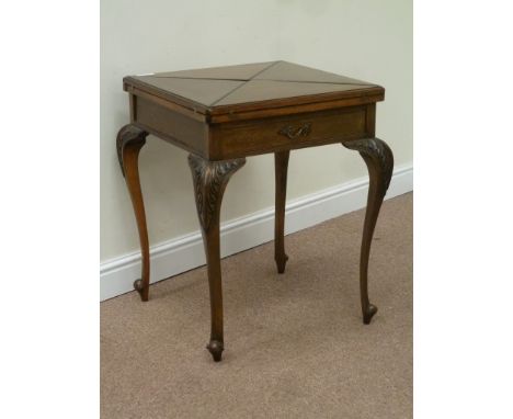 Late Victorian walnut card table, envelope swivel top revealing counter wells and inset baize, cabriole legs with carved deta