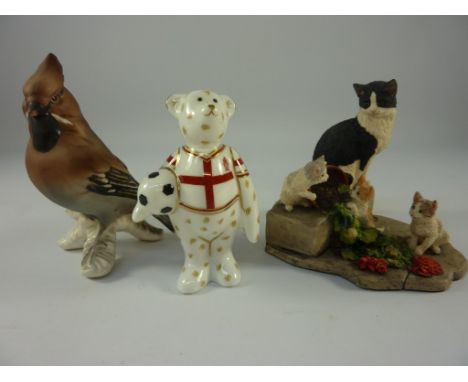 Royal Crown Derby 'England Footballer Bear', Border Fine Arts 'Sunday Morning' cat group and a Goebel bird