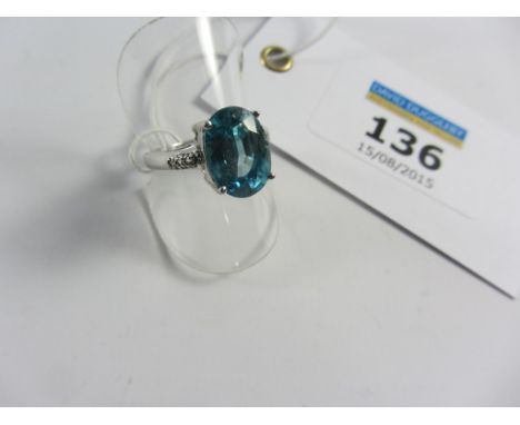 Blue topaz  and diamond white gold ring hallmarked 9ct