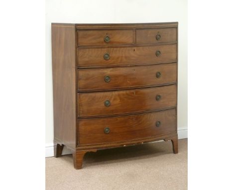 Early 19th century mahogany bow front chest fitted with two short and four long graduating drawers, inlaid stringing, raised 