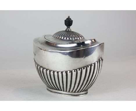 A late Victorian silver oval tea caddy, with demi-fluting decoration, Sheffield, 1899, 7oz (NC)