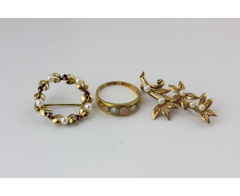 A ruby and pearl circlet brooch in 9ct gold; a pearl spray brooch in 9ct gold and a coral and pearl ring in 18ct gold