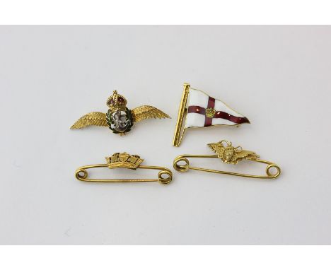 A 15 carat gold Naval crown bar brooch; a Chinese gold filigree butterfly brooch; a 9ct gold and enamel fleet Air arm brooch;