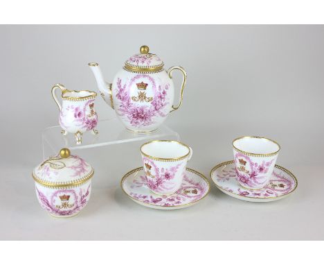 A Royal Worcester armorial tea set for two bearing the crest of Princess Mary Adelaide of Cambridge, Duchess of Teck, by repu