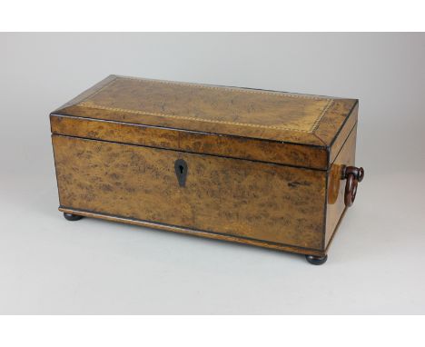 A Victorian burr walnut tea caddy with inlaid decoration, the interior containing three mahogany caddies with galvanised inte