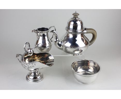 A silver plated three piece tea set with plain bodies, together with a helmet shaped sugar bowl with scoop