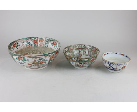 Three various oriental porcelain bowls including a Cantonese famille rose bowl, a Japanese Imari pattern rice bowl and anothe