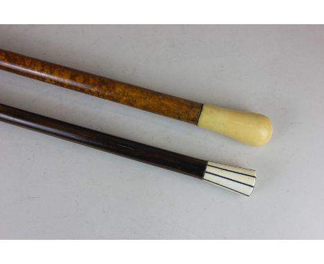 A 19th century ivory topped walnut walking stick together with an ivory and rosewood cane