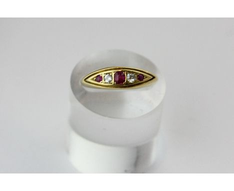 A ruby and diamond five stone ring in 'pea pod' setting in 18ct gold