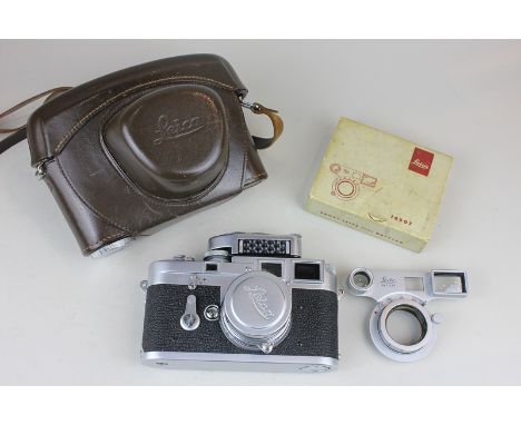 A 1950's Leica camera double wind with 1:2 lens and a light meter in brown leather case together with a Leica 16507 close up 