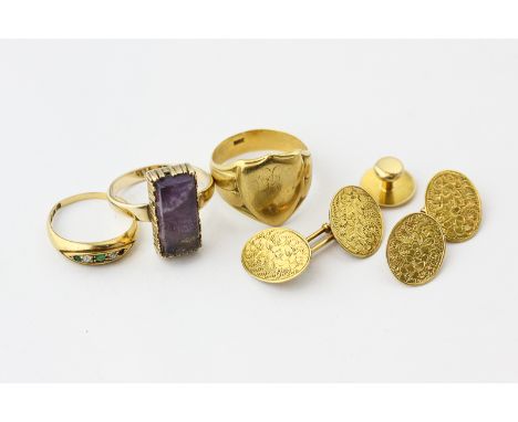 A pair of 15ct gold cuff links, an 18ct gold stud, a gold signet ring and two gem set rings