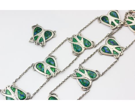 An attractive silver and enamel Art Nouveau belt strung with ten (plus one loose) heart shaped links enamelled in shaded blue