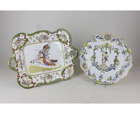 A French faience pottery two handled rectangular serving dish with scalloped edge depicting Joan of Arc together with another