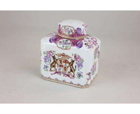 A Chinese porcelain tea caddy with a hand painted armorial crest showing two panthers rearing up with 'fide et fortitudine'  