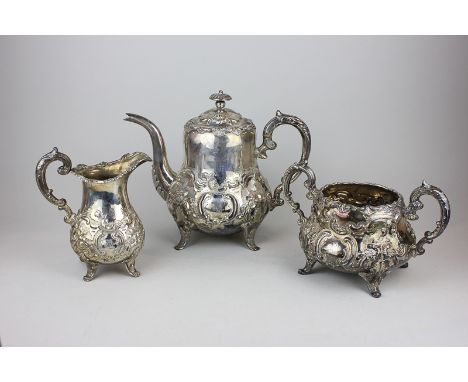 A matched Victorian style  three piece tea set, the milk jug and sugar bowl by William Hunter, London 1850, the teapot a Chin